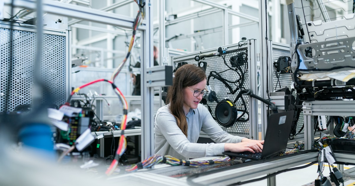 Engineer preparing an injection molding quote with CAD files and material specifications